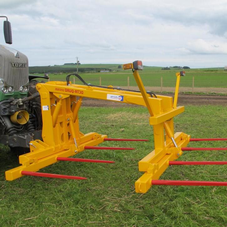 Octa-Quad Bale Handling System - front section for carrying 4 round bales or 2 Heston bales at a time. Showing folding tines version.