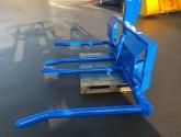 HD double fold up wrapped bale handler finished in New Holland blue